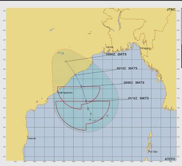 A satellite map of the Bay of Bengal showing a tropical cyclone, labeled as Tropical Cyclone 01B. The image includes cloud formations, a grid overlay, and weather tracking lines with timestamps and wind speeds, such as 30KTS and 35KTS. Visible locations include India, Myanmar, and Sri Lanka. Text overlays include "TROPICAL CYCLONE 01B", "VALID TIME: 01/12/00Z", and "PRODUCT OF JTWC/ATCF".