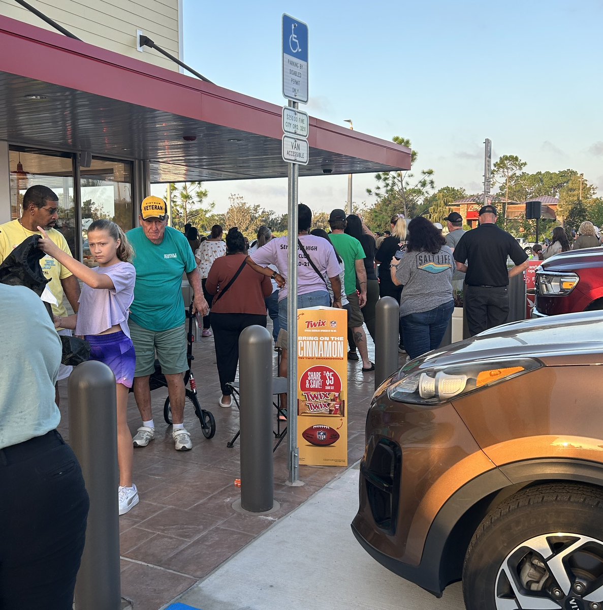 Wawa Grand Opening this morning! 
Erin Moughan poses with the mascot, Wally the Goose. Seminole High School band performs.