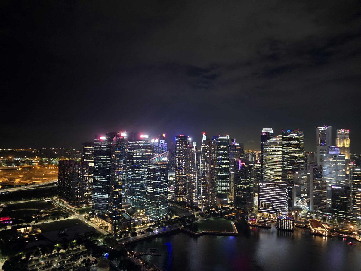 Humza_Pixelette's tweet photo. Rooftop in Singapore, city glowing beneath us. 

The view was incredible, but the real highlight was my team; good conversations, laughter, and the kind of night you don’t forget.

#TOKEN2049Singapore https://t.co/YcugrdMbgh