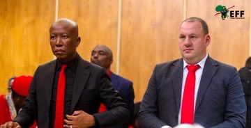 The Magistrate asked accused number 2 to  move from the dock, after she found him not guilty. Mr Adriaan Snyman told the Magistrate he was fine, and remained in there by the President.

She asked the President to stand as she addressed him, Adriaan stood again with the President.