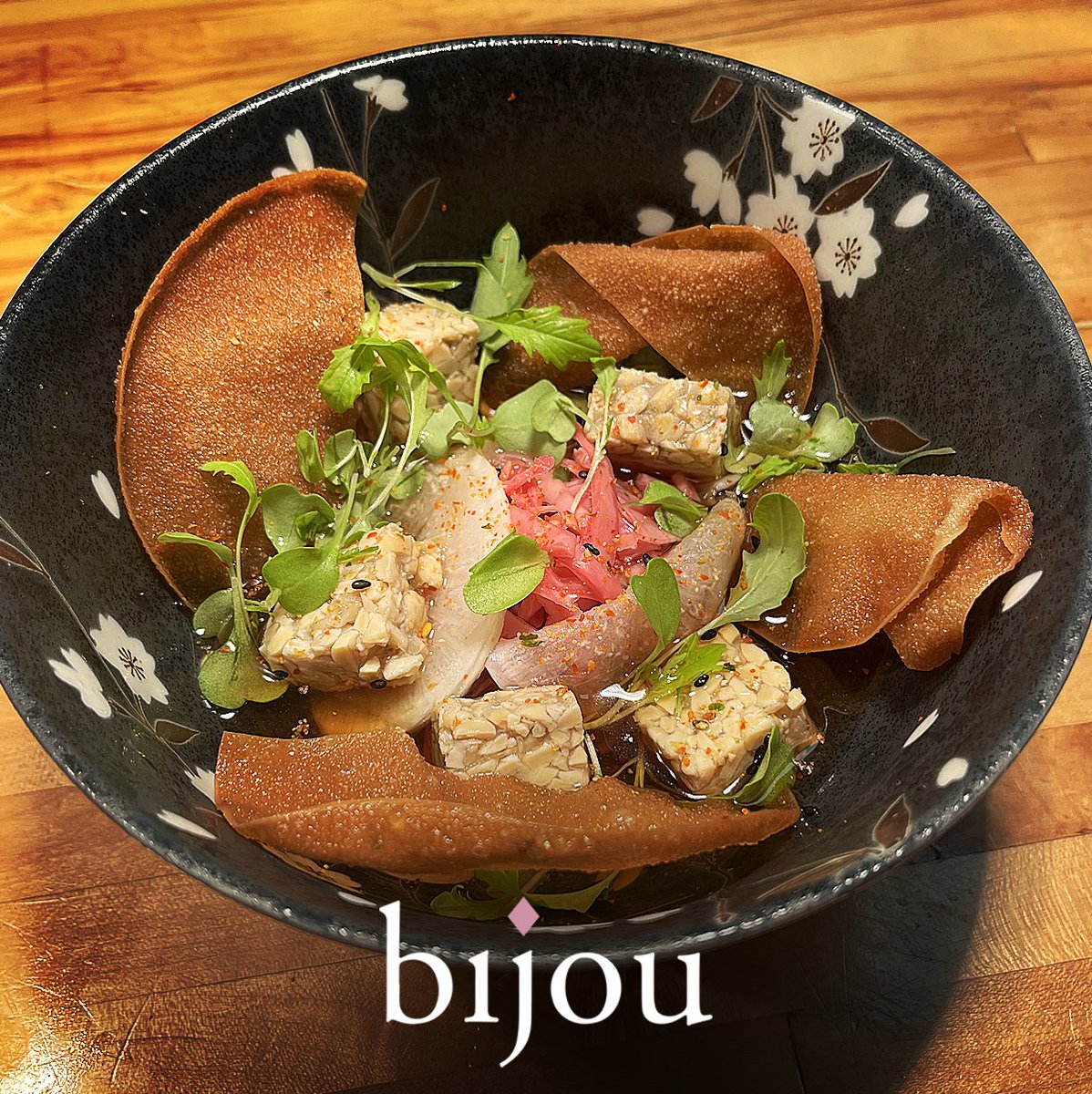 BijouRestaurant's tweet image. NEW at Bijou: Asian Bowl 🍜🌿
Marinated tempeh, miso &amp;amp; dulse broth, pickled daikon, red cabbage, togarashi + crisp wonton cracker. Plant-based, hearty, and refined. ✨
📍 Now available at Bijou — link in bio or bijourestaurant.com

#AsianBowl #BijouStratford #FarmToTable