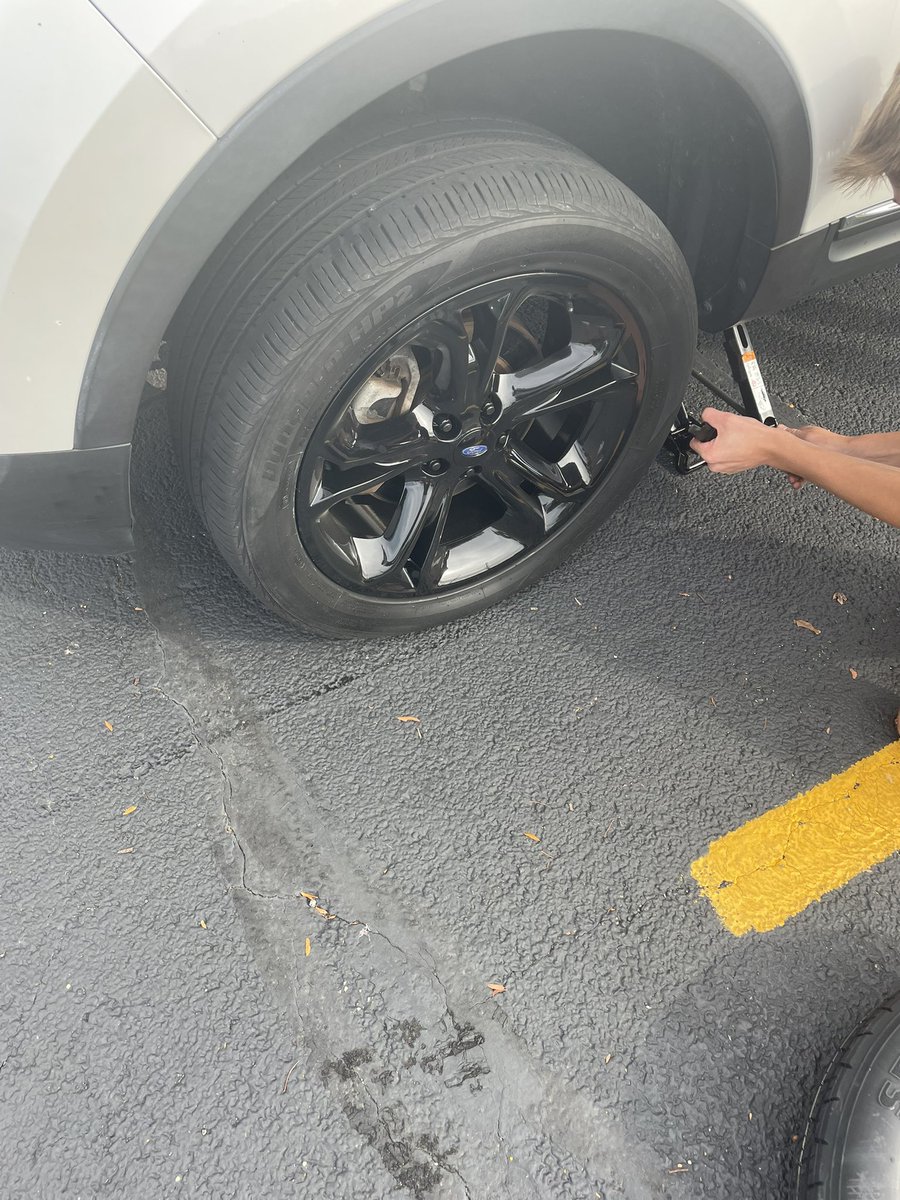 On my way out of school, had to help a student change a tire!