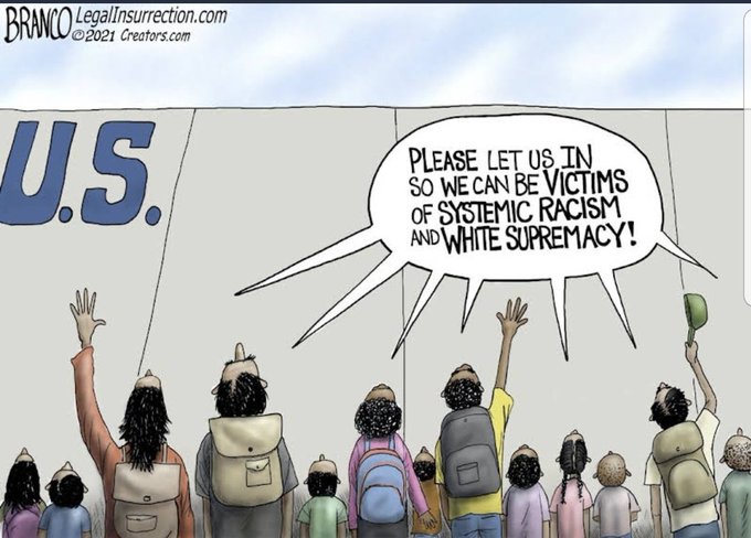 A cartoon depicting a group of migrants standing at a border wall labeled "U.S." One migrant raises a hand with a speech bubble saying "PLEASE LET US IN SO WE CAN BE VICTIMS OF SYSTEMIC RACISM AND WHITE SUPREMACY!" The migrants carry backpacks and wear casual clothing. A watermark reads "LegalInsurrection.com © 2021 Grifters."