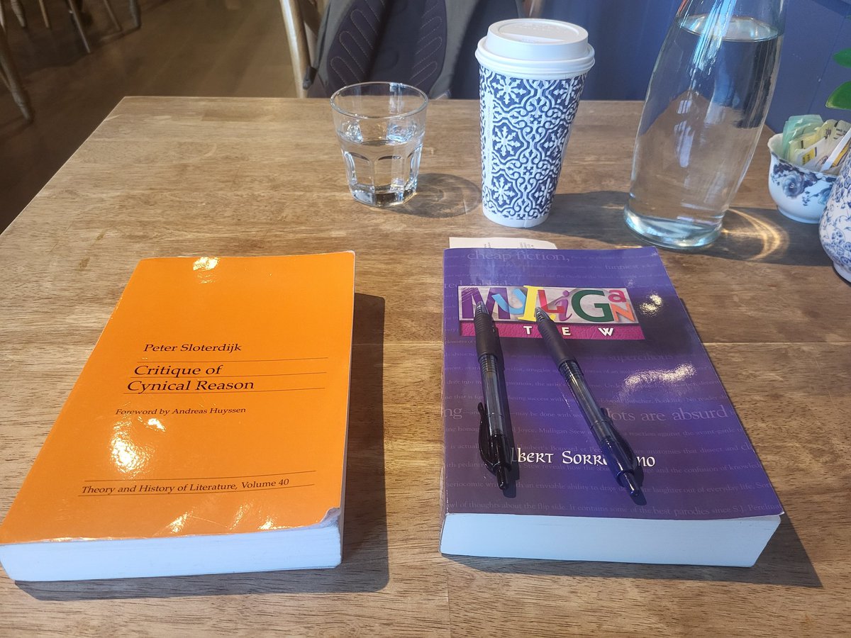 Trying extra hard to look like a serious intellectual at a local café. ONLY the most attentive would know I've been doom scrolling on Twitter the entire time.