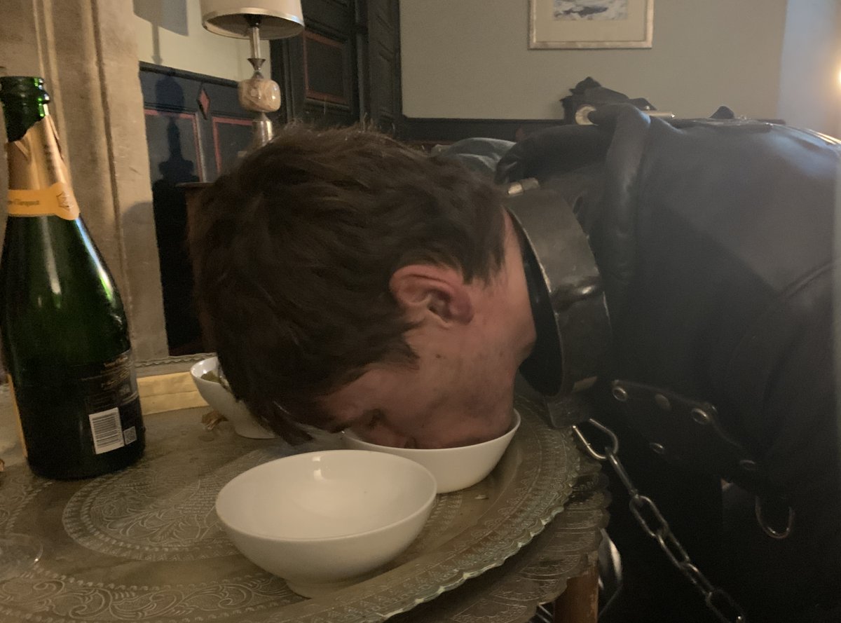 When a new Sub is generous enough to bring me a nice bottle of Champaign. As his Dom, I feel, "duty - bound,” to share it appropriately.
On his knees, in a heavy leather strait jacket and steel collar. @Lostpupy, was hand fed with charcuterie and olives, while sipping his
