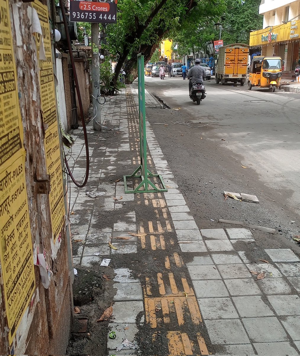 ImKanugo's tweet photo. @chennaicorp new footpath with special tiles for guidance of visually impaired people installed. Good initiative. But can they really use it? What is the point? https://t.co/b1yRkXxCec