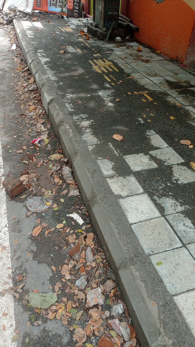 ImKanugo's tweet photo. @chennaicorp new footpath with special tiles for guidance of visually impaired people installed. Good initiative. But can they really use it? What is the point? https://t.co/b1yRkXxCec