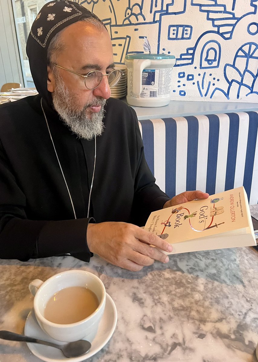 AndyOllerton's tweet photo. Delicious dinner and inspiring conversation with @BishopAngaelos after a long day of filming in London. Exciting to hear of young people finding faith in the Coptic Orthodox Church and to give Bishop Angaelos a copy of my new book #thequietrevival @biblesociety https://t.co/YyAIJKWsK1