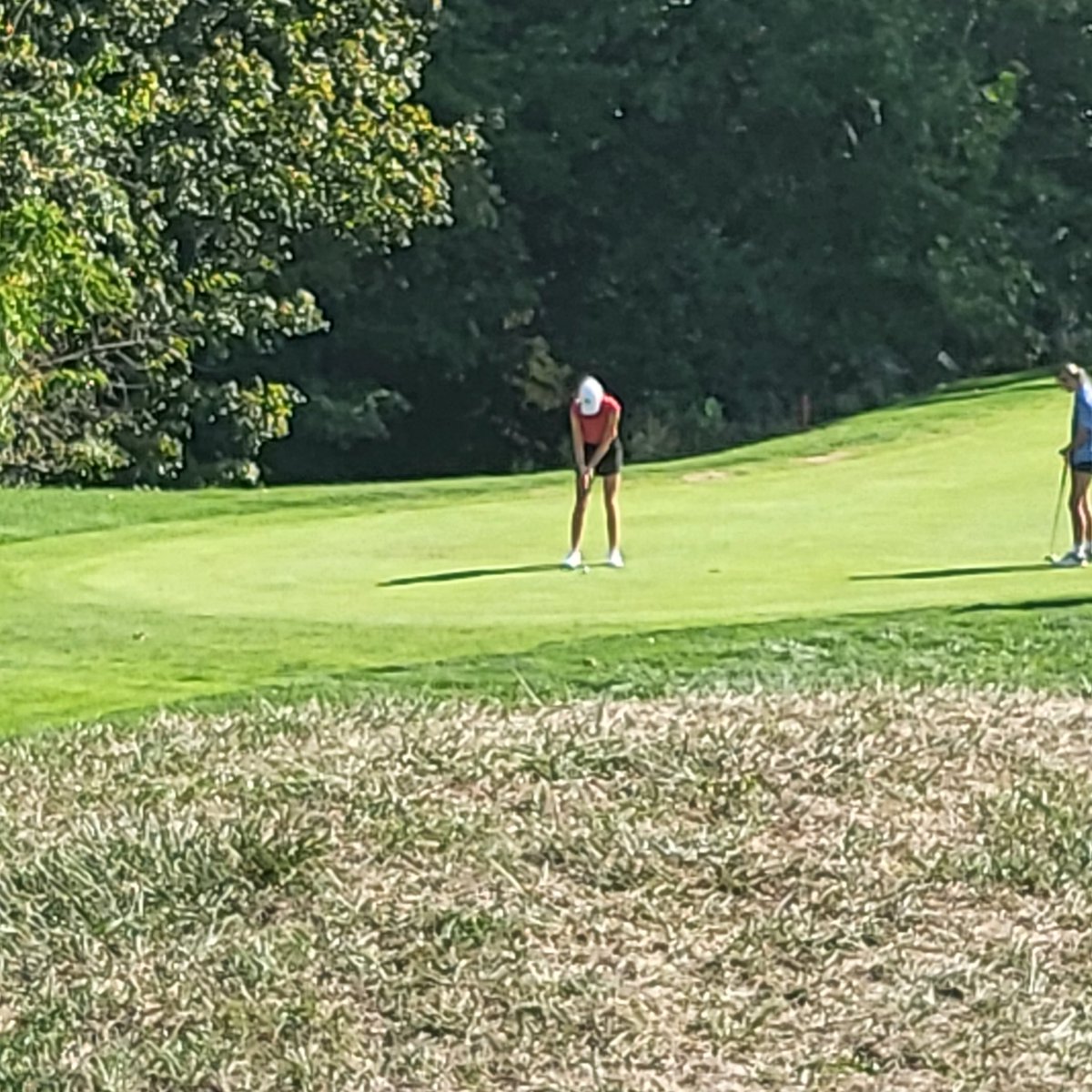 Laney putts out on the 18 hole at the District Golf Tournament. She finished with a 79. Her score placed her fifth overall. Congratulations, Laney!