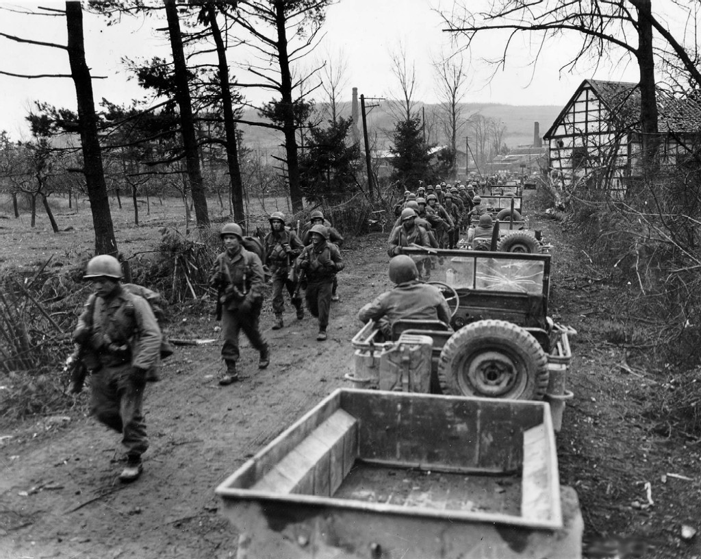 WW2Facts's tweet image. Men of Company C, 1st Battalion, 18th Infantry Regiment, US 1st Infantry Division marching toward Frauwüllesheim, Germany, after crossing the Roer River on February 28, 1945.

#History #WWII