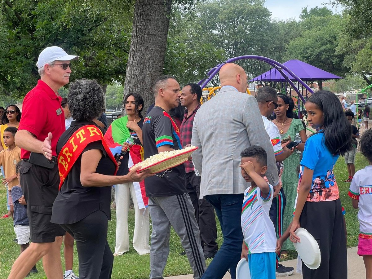 Natey49's tweet photo. Dallas Public Diplomacy hosted Richardson Mayor Omar Amir and City Councilman Ken Hutchenrider at the 34th Eritrean Independence celebration, where our Eritrean bikers crossed the finish line to greet and commemorate Independence Day. #npdg #eritea #amiromar #kenhatchinrider https://t.co/9KmYYxuSdJ