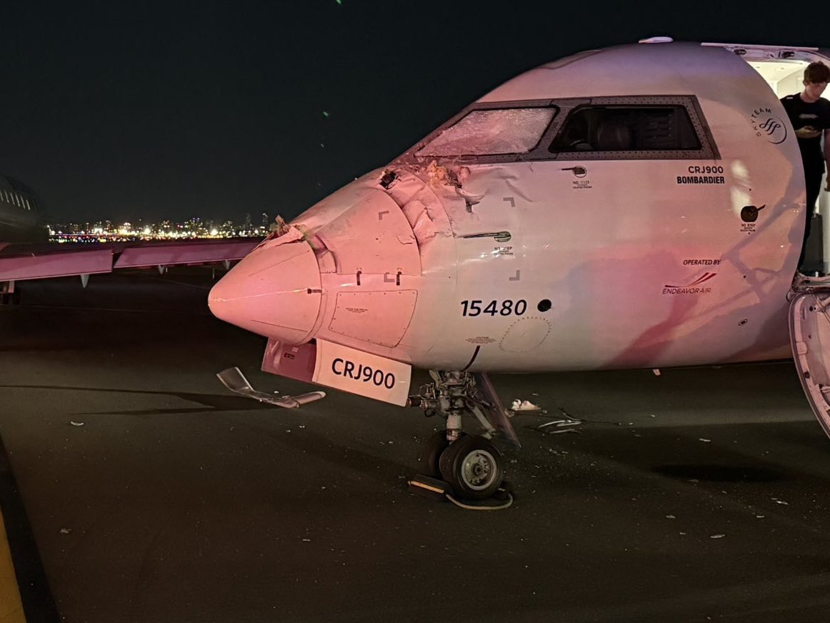 Two Delta regional jets collided at low speed while taxiing at LaGuardia  Airport (LGA) at approx 9:56 PM. The right wing of one plane struck the  nose of the other, detaching a