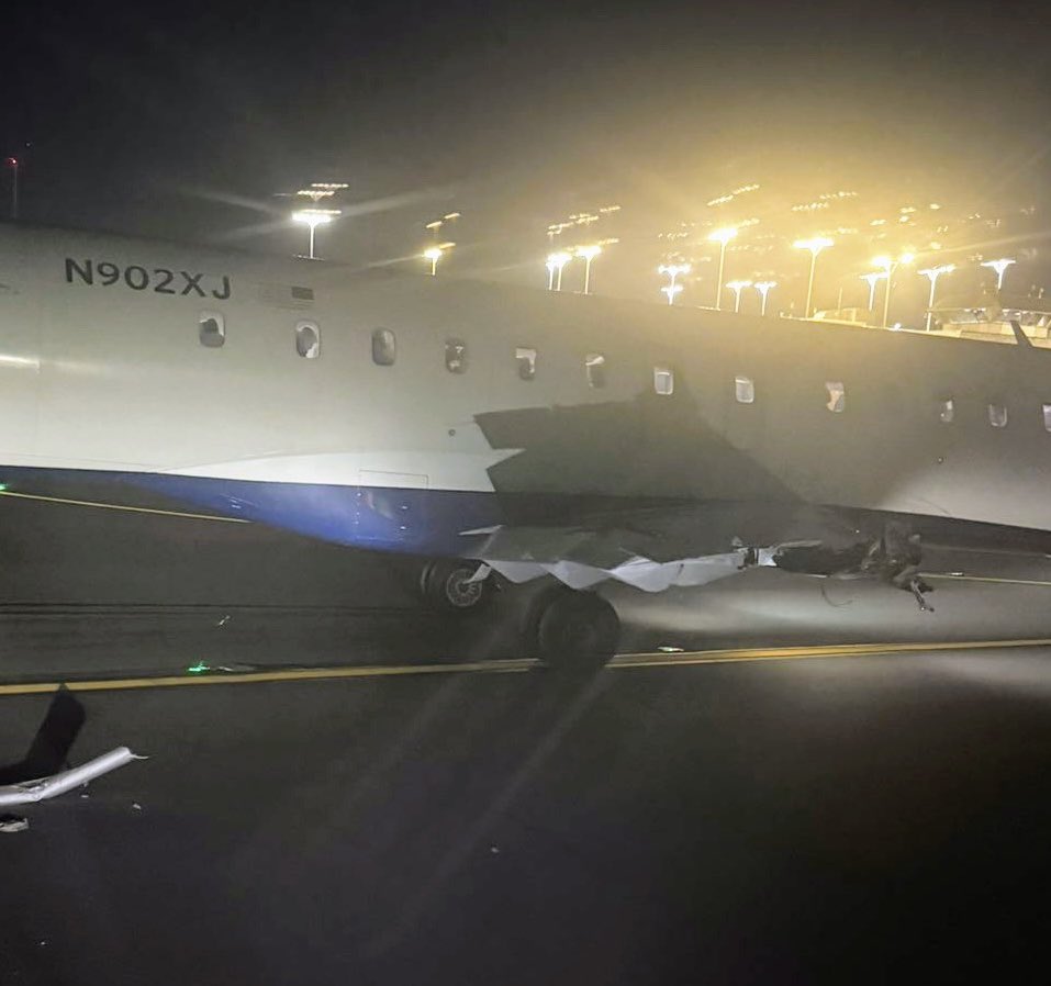 Two Delta regional jets collided at low speed while taxiing at LaGuardia  Airport (LGA) at approx 9:56 PM. The right wing of one plane struck the  nose of the other, detaching a