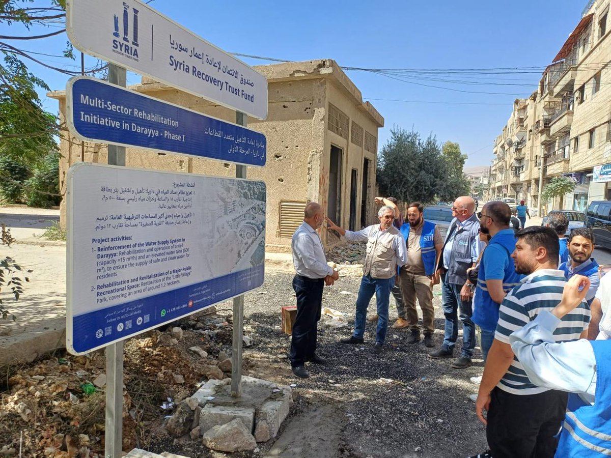SRTFUND's tweet image. Aid Fund for Syria  #AFS and the SRTF have officially launched the activities of their first projects in #Darayya. 

To mark this milestone, the SRTF DG, Eng. @HaniKhabbaz, and Ms. Andrea Quaden, Executive Director of AFS, a key strategic and collaborating partner, conducted a…