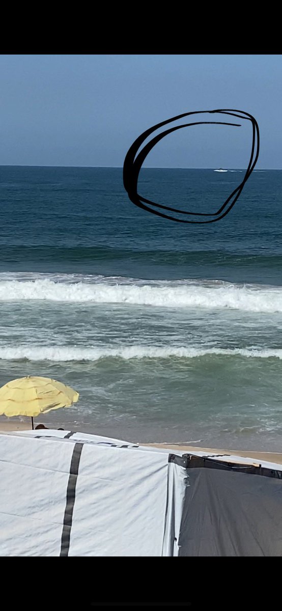 Israeli occupation boats approach and open fire at the Gaza beach in Deir al-Balah.