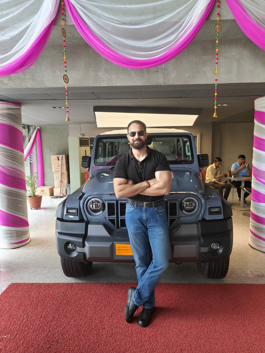 Thank you <a href="/MahindraRise/">Mahindra Group</a> <a href="/anandmahindra/">anand mahindra</a> <a href="/Mahindra_Auto/">Mahindra Automotive</a> making my Dusshera special and the timely delivery of my ROXX #thar #tharvibes #mahindrathar