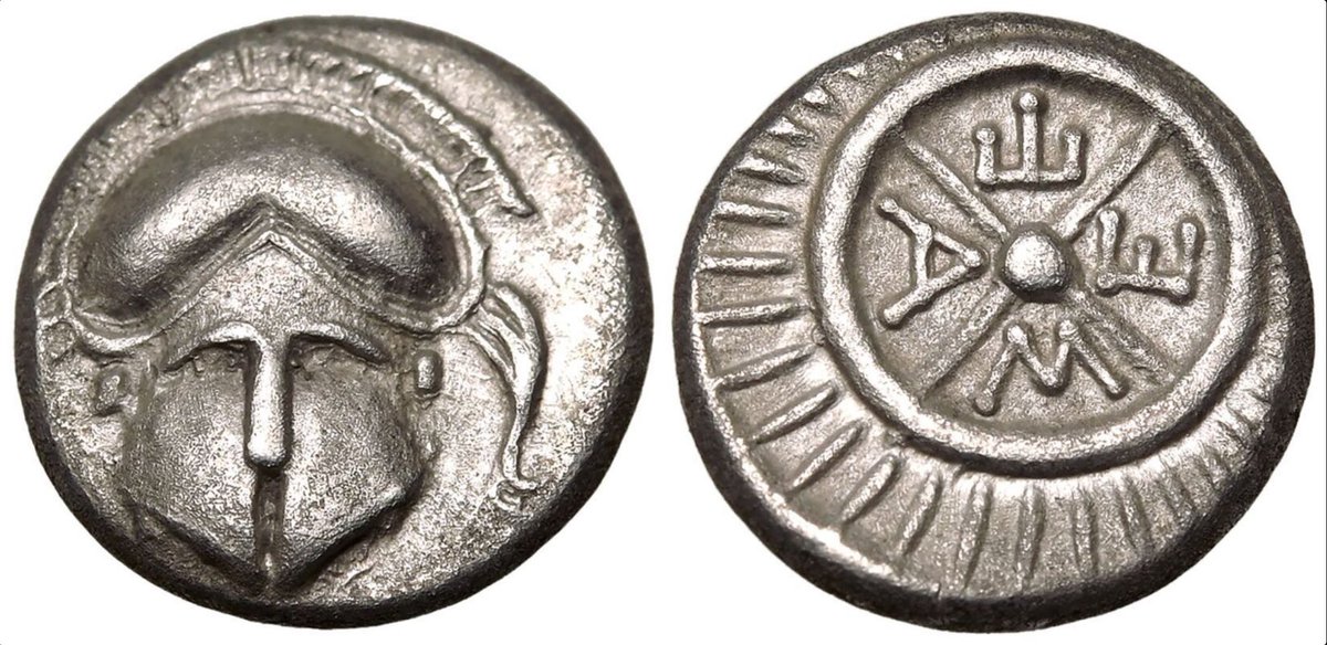 Ancient Greece coin from Thrace, Mesembria, AR Diobol, ca. 4th c. BC
Corinthian Helmet and Chariot Wheel. 
Bought at auction.