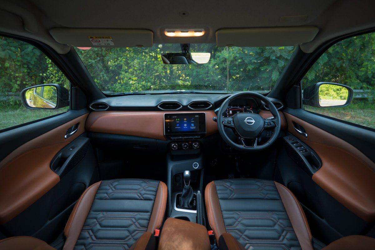 nissanza's tweet image. Control at your fingertips: touchscreen, climate and connectivity. What is the first thing you’re playing with in your Magnite?  #DEFYORDINARY #NISSANSA Discover more: bit.ly/3u0fUlW