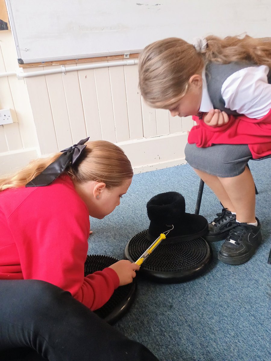 StJosephsTad's tweet image. St Therese tested friction! They used Newton meters to drag their shoes across different surfaces to see which had the greatest resistance.