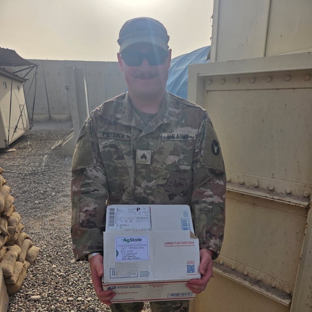 AgState_Iowa's tweet photo. Recently, we sent a care package to one of our own, Cody Petska, who is currently deployed. Cody shared a photo and note back:  “I really appreciate the goodies and card game. Thank you very much for setting this up!”  

#AgState #SupportOurTroops #TeamAgState https://t.co/MHRbGdeczs
