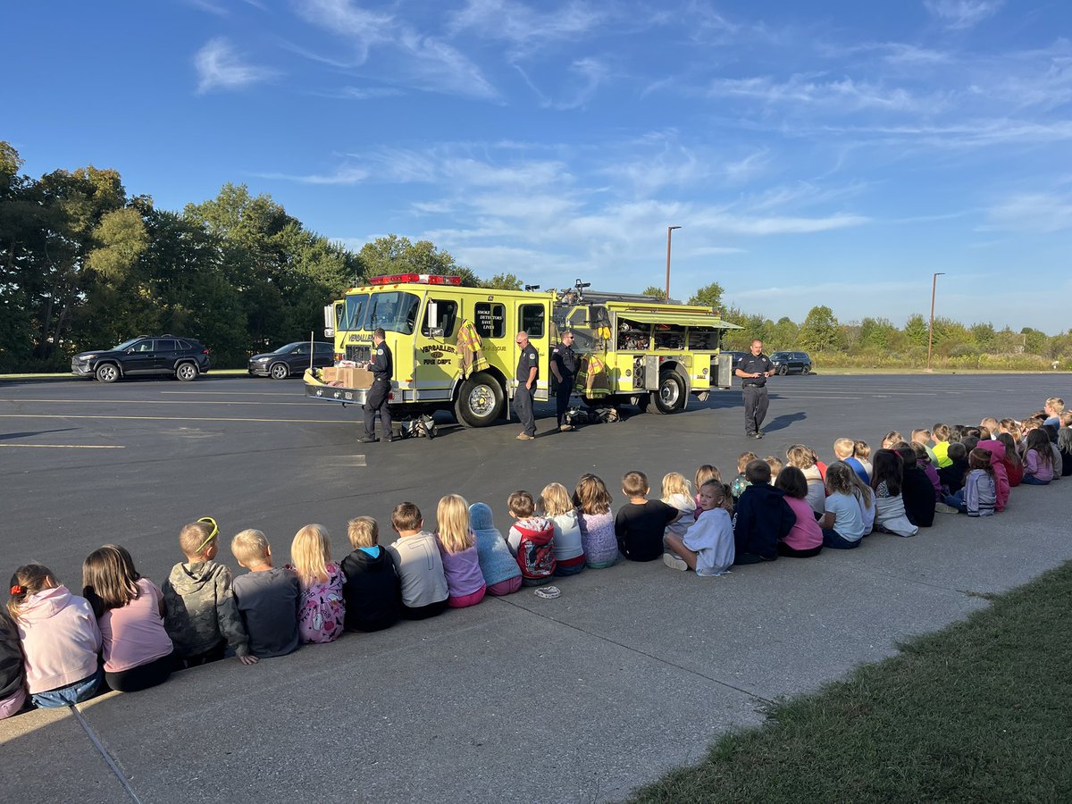 SRES first grade students learned about fire safety from the Versailles Firefighters!