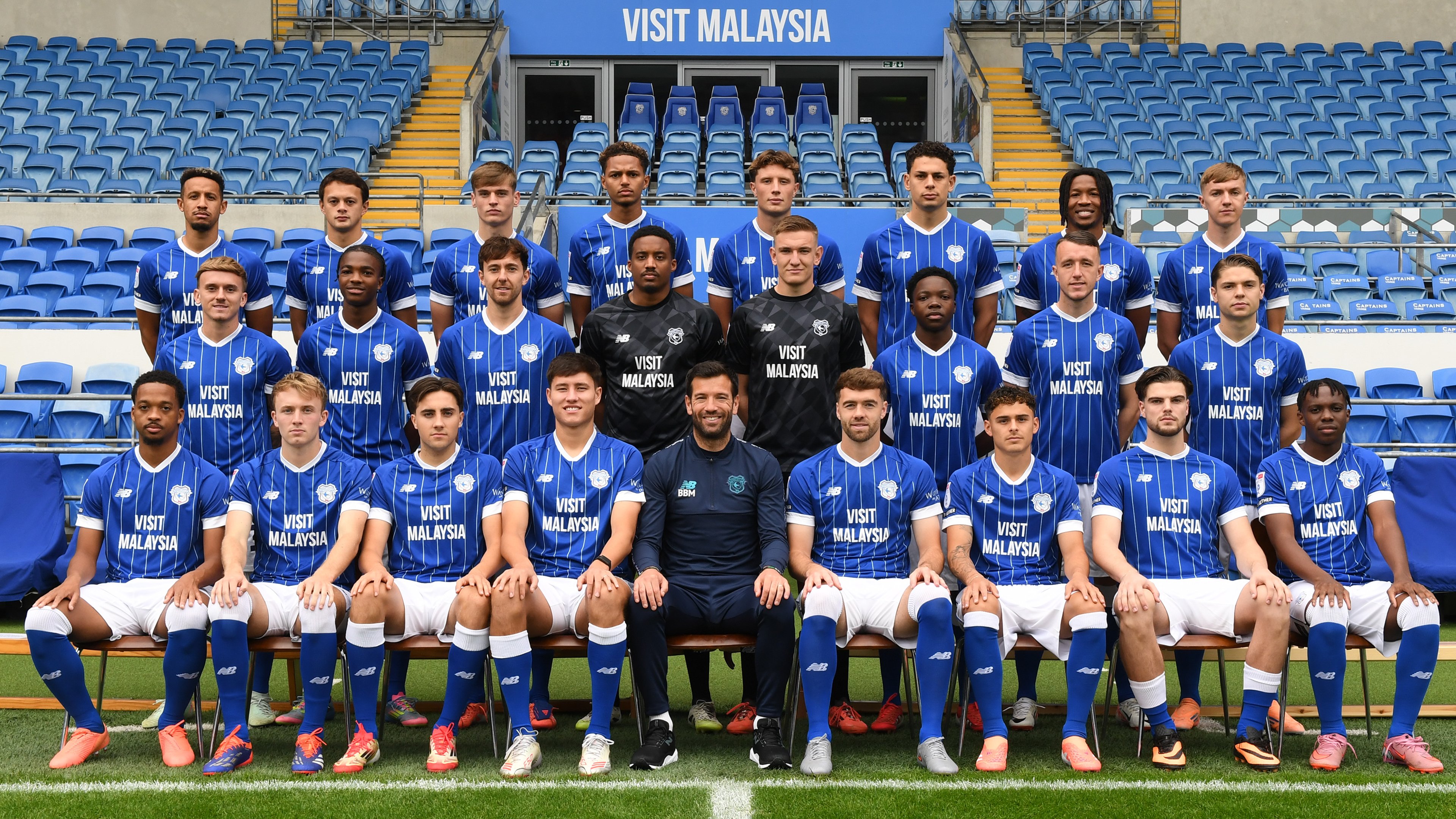 The Cardiff City Football Club squad photo for the 2025/26 season, containing the First Team squad and Head Coach, Brian Barry-Murphy.