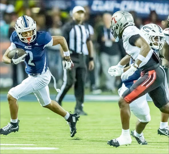 ahsaaradio's tweet photo. AHSAA Top Prospect of the Week presented by Alabama National Guard Recruiting - https://t.co/wgH6Jo7wsp
Corey Barber - Clay-Chalkville Football Program
AHSAA WEEK 5 FOOTBALL SPOTLIGHT
Clay-Chalkville senior receiver Cory Barber
Delivers in the Clutch …. Again, and Again
MONTGOMERY – Clay-Chalkville High School senior wide receiver Corey Barber has a knack for making the dramatic play when his team needs it.
In last week’s come-from-behind 28-25 victory over defending Class 7A Thompson in the AHSAA Network/Alabama Public TV Game of the Week televise live across the nation by WOTM TV, Barber had not one but two clutch plays when his team needed it most.
Trailing 25-21 late in the fourth quarter, Barber caught a pass Aaron Frye and raced 86 yards to the 3-yard line to set the game-winning touchdown three plays later with 3:44 left in the game. His game-winning catch, which came after two plays lost seven yards back to the 10-yard line, was a one-handed grab he made in the back of the end one to put the Cougars (6-0) of Coach Stuart Floyd ahead for good. The catch also landed Barber in this week’s AHSAA Football Spotlight for Week 5.
His 86-yard pass reception he carried to the 3-yard line earlier in the fourth quarter from quarterback Aaron Frye set up his game-winning catch a minute later. Two running plays lost seven yards to set up the third-and-goal pass play from the 10-yard line.
He finished the night with eight catches for 149 yards and two touchdowns. He also rushed for 72 yards on eight carries and one score.
“You get in those situations, you’re going to call your best player,” Clay-Chalkville coach Stuart Floyd said. “He is going to deliver. “
Thompson (4-2) took a 24-21 lead on a 20-yard field goal by Ethan Black with just over seven minutes remaining. Three plays later, the Cougars faced third-and-12 from their 11-yard line and called timeout with 5:23 remaining.
Frye connected with Barber, who turned the short route into an 86-yard reception before he was tackled at the 3 to set up his final play.
Barber now has 32 catches this season for 657 yards and nine touchdowns. Clay-Chalkville High School