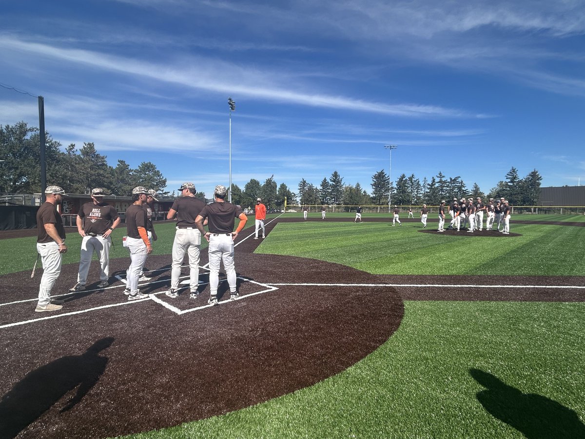 "Go check out the field, fellas...."    Can you tell which are pitchers and which are catchers?