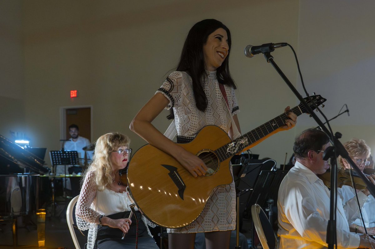 katiegaribaldi's tweet image. Catching up… Singing an orchestral arrangement of my song “Dear Universe” with @svorchestras’ new Simi Valley Symphony Orchestra at its debut at @simifilmfest’s Film Music Concert was pure magic…&amp;amp; even more so seeing my Joe conduct our long-held dream into reality. Grateful! ❤️