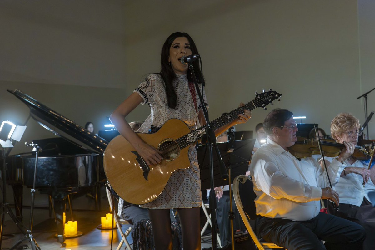 katiegaribaldi's tweet image. Catching up… Singing an orchestral arrangement of my song “Dear Universe” with @svorchestras’ new Simi Valley Symphony Orchestra at its debut at @simifilmfest’s Film Music Concert was pure magic…&amp;amp; even more so seeing my Joe conduct our long-held dream into reality. Grateful! ❤️