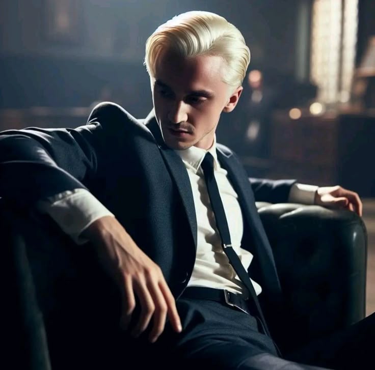 Draco lounged in the back corner of Snape’s darkened classroom, the faint scent of potions clinging to the air. He twirled his wand between his fingers, eyes flicking toward the door at every creak of the castle. He shouldn’t be here—but the thrill of being somewhere forbidden.