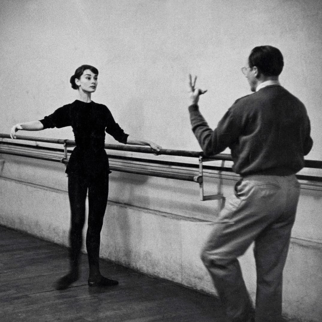 audrey hepburn by ed feingersh at a dance class with lucien legrand at the paris ballet, 1956