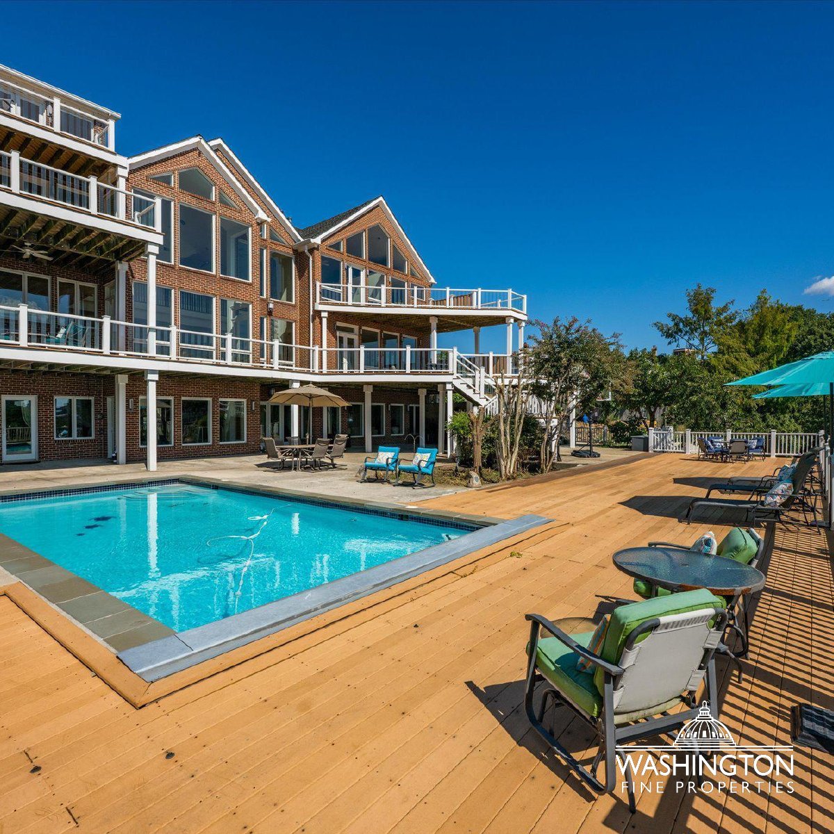 Set atop Arlington Ridge with sweeping city &amp; monument views, this 13,400 SF custom home boasts a chef’s kitchen, dramatic family room, luxe primary suite, theater, gym, and wine room. Outside, expansive decks, terraces, and a heated pool complete this entertainer’s dream.