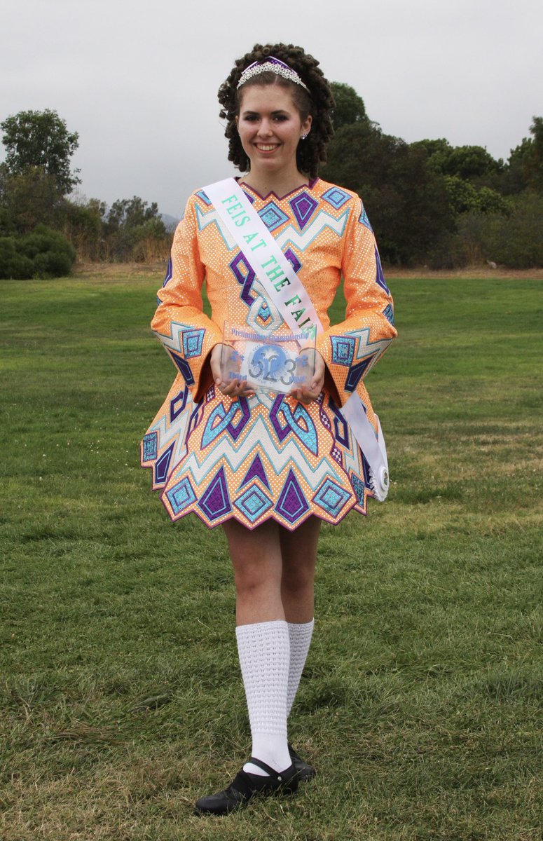 torreylee's tweet photo. I don’t see the difference. #TSTheLifeOfAShowgirl vs The Life of an Irish Dance Girl.
Me about 15 years ago with my orange Irish dance dress! https://t.co/MyUlaU7CRA