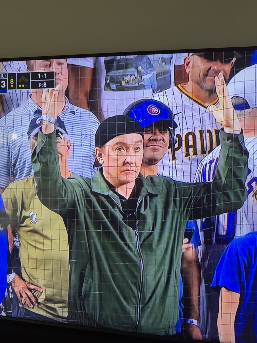 NickScholtz's tweet photo. John Cusack giving us the Say Anything boom box pose. This Cubs Padres game has everything. https://t.co/nSTGxZi6D1