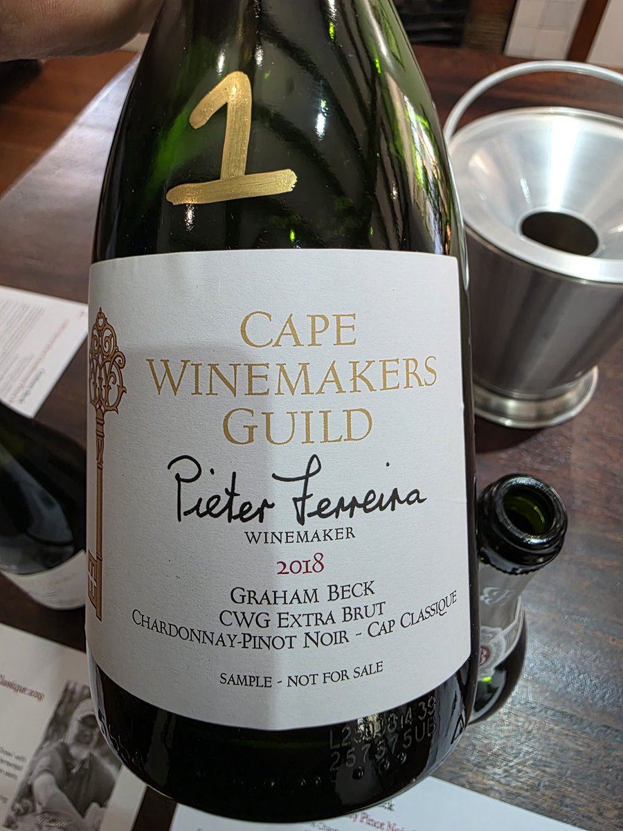 <a href="/CapeWinemakersG/">CapeWinemakersGuild</a> <a href="/SouthernSunGrp/">Southern Sun</a> <a href="/StraussFineWine/">Strauss & Co Fine Wine Auction</a> <a href="/StellWineRoute/">Stellenbosch Wine Routes</a> <a href="/stellenboschcab/">Stellenbosch Cab</a> <a href="/SandtonCity/">Sandton City</a> <a href="/SandtonCentral/">Sandton Central</a> <a href="/ErnieEls_Golf/">Ernie Els</a> <a href="/TheBig_Easy/">Ernie Els</a> <a href="/ernieelswines/">Louis Strydom</a> <a href="/boschkloofwines/">Boschkloof Wines</a> <a href="/RKershawWines/">KershawWines</a> <a href="/winesofelgin/">winesofelgin</a> <a href="/chardonnaysouth/">Chardonnay Association of South Africa</a> <a href="/DewaldtHeyns/">Dewaldt Heyns</a> <a href="/Swartland/">Swartland Wine & Olive Route</a> <a href="/Shiraz_SA/">Shiraz_SA</a> <a href="/Savagewines/">Savage</a> <a href="/lismorewine/">Samantha O'Keefe</a> <a href="/NeilEllisWines/">Warren Ellis</a> <a href="/beeslaarwine/">Abrie Beeslaar</a> <a href="/PinotageSA/">Pinotage Association</a> <a href="/Beaumontwines/">Beaumont Winery</a> <a href="/BotRiverWines/">BotRiverWines</a> <a href="/AABadenhorst/">AA Badenhorst</a> <a href="/LudditeWines/">Luddite Wines</a> <a href="/grenache_global/">Grenache Association</a> <a href="/AtaraxiaWines/">Ataraxia Wines</a> <a href="/mastersofwine/">Masters of Wine</a> <a href="/StormWinesSA/">Hannes Storm</a> <a href="/hermanuswine/">Hermanus Wine Route</a> <a href="/degrendelwines/">De Grendel Wines</a> <a href="/degrendelrestau/">DeGrendel Restaurant</a> <a href="/dbvlwineroute/">DurbanvilleWineRoute</a> <a href="/NewtonJohnsonSA/">Newton Johnson Vineyards</a> <a href="/BarthoEksteen/">Bartho Eksteen</a> <a href="/HermanusTourism/">Hermanus Tourism</a> <a href="/Jordan_Wines/">Jordan Wine Estate</a> <a href="/PaulCluverWines/">Paul Cluver Family Wines</a> <a href="/GreatDomainesSA/">Great Domaines</a> <a href="/MullineuxWines/">The Mullineuxs</a> <a href="/CheninBlancSA/">Chenin Blanc SA</a> <a href="/CheninKing/">Bruwer Raats</a> <a href="/DavidandNadia/">David&Nadia</a> <a href="/GrahamBeckSA/">Graham Beck Bubbly</a> <a href="/RobertsonWineV/">RobertsonWineValley</a> <a href="/SilverthornMCC/">Karen & John Loubser</a> Cape Winemakers Guild 

Pieter Ferreira
Graham Beck CWG Extra Brut Chardonnay – Pinot Noir Cap Classique 2018

A geographically diverse blend from Robertson, Stellenbosch, and Cape Agulhas (65% Chardonnay, 35% Pinot Noir), this Cap Classique is freshness and elegance in motion.