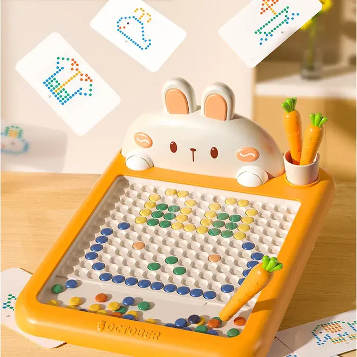 Inspire your child’s creativity with this Montessori magnetic bead drawing board, featuring a cute bunny design and easy-to-use carrot pen. It helps develop fine motor skills, color recognition, and imagination while keeping play fun and mess-free.
