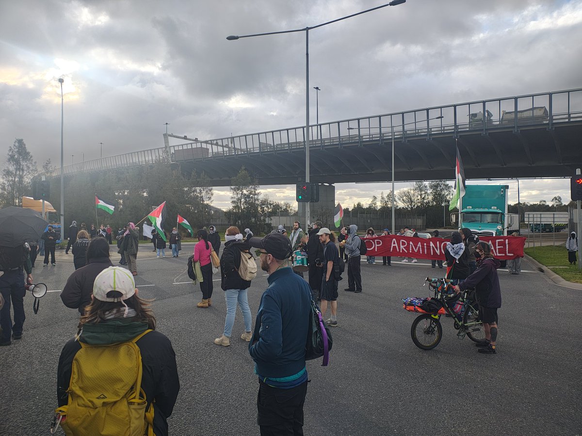 DaveMilbo's tweet photo. Activists have blocked the road leading to Webb Dock in Port Melbourne in solidarity with Palestine, the Sumud Flotilla, and the six Australians abducted illegally by Israel. https://t.co/uCICKdXmll