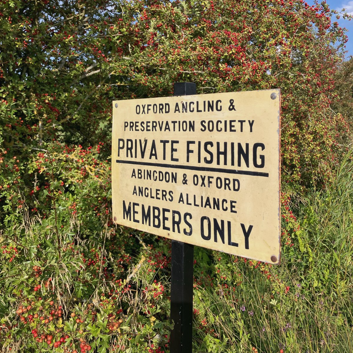 Signs of the Thames Path.