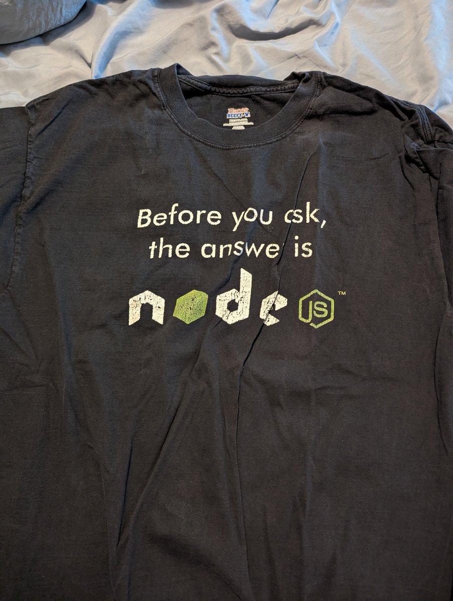 deanshub's tweet photo. Damn @bunjavascript , had this shirt for over a decade now I need a new one https://t.co/DoVRRIj1dh
