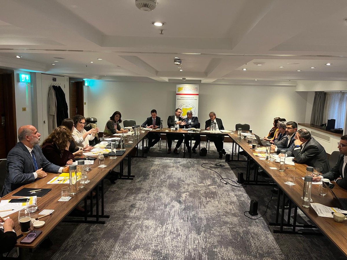 sydcuk's tweet photo. 📚 At an academic roundtable in London, SDC Public Relations Co-Chair Hassan Mohammad Ali stressed that a centralised Syria threatens minority rights. 

He argued that only a decentralised model, building on 15 years of self-administration, can ensure justice, partnership & stability.