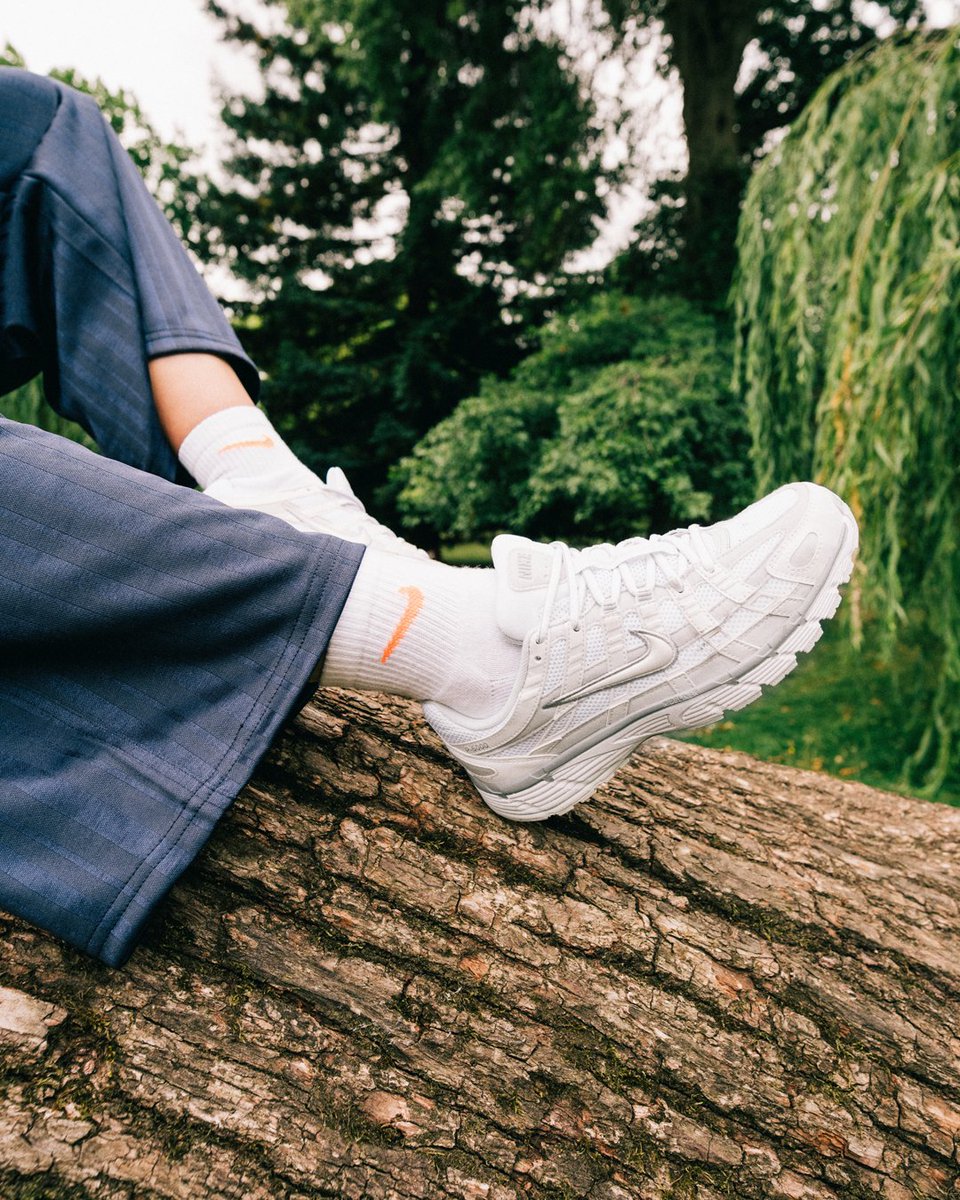 nike p6000 sneakers in triple white