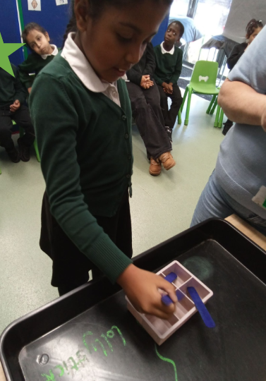 Maths &amp; Science Fun! The SLS children were busy with hands-on learning today. In maths, they practiced one-to-one matching by placing lolly sticks in ice cube trays. In science, they became young chemists, learning how to separate items from sand using a sieve.