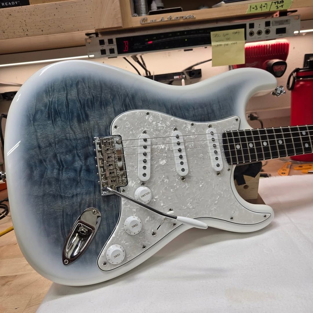 Fender's tweet image. Stay cool with this hand-stained Quilted Maple Top Strat in a Larimar color palette — built by Jason Smith and headed to Fender Custom Shop Japan. ❄️