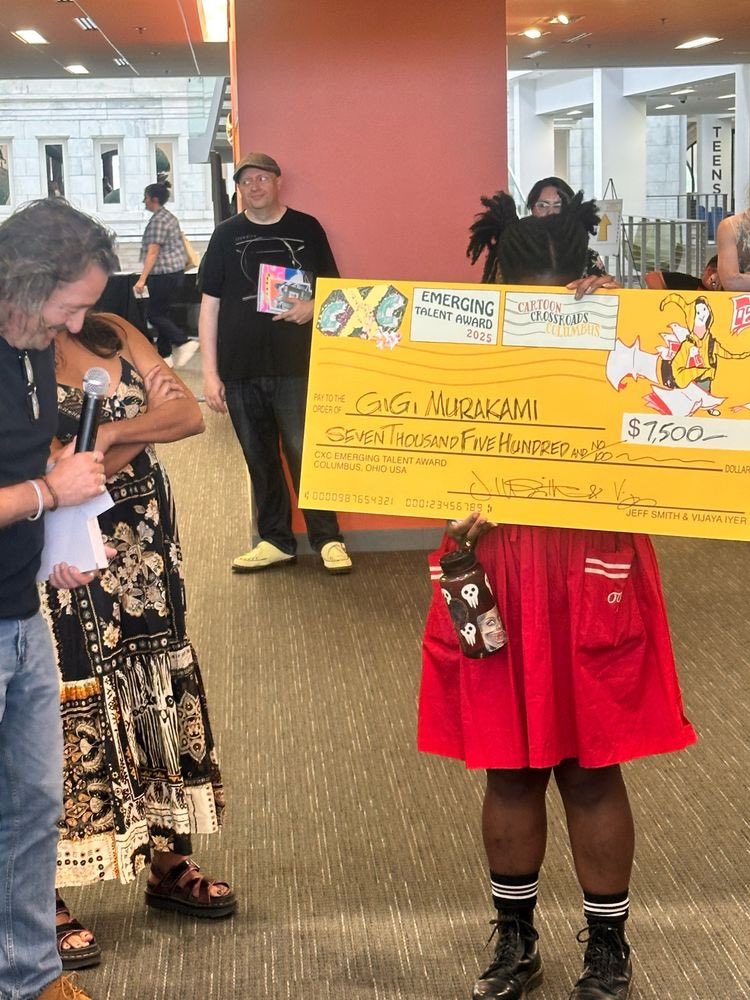 gigimurakami's tweet photo. @juhmeer Last month, I won an emerging talent award for manga/ cartooning by Cartoon Crossroads Columbus 🥹👉🏾👈🏾🖤 https://t.co/phb1Cb1aiJ