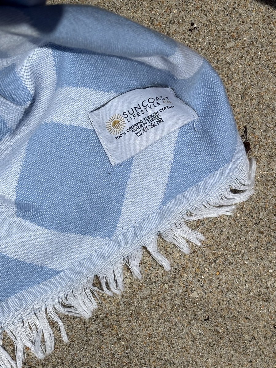 The Coastal Prism in Caribbean Blue 🌊 One towel for beach days, patio hangs, park picnics, and everything in between. Shop now → SuncoastLifestyle.co
