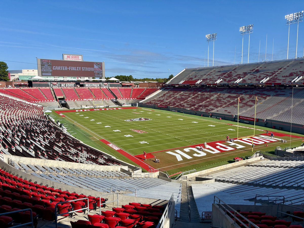 Paint it red. Putting the final touches on the home turf. Will be a beautiful day for <a href="/PackFootball/">NC State Football</a> tomorrow!