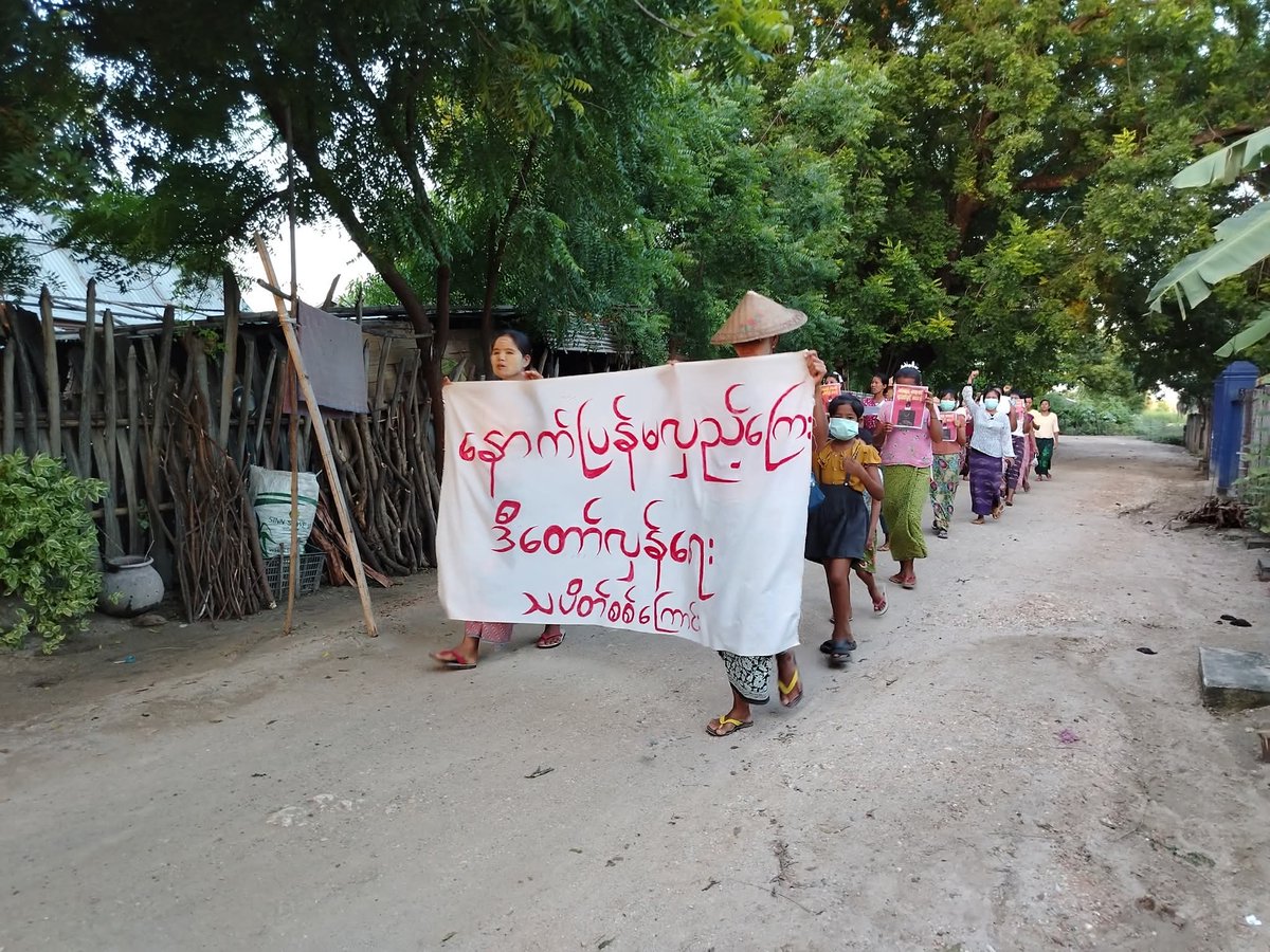 naingnaingaung's tweet photo. The"This Revolution Has No Turning Back" protest column in Sagaing Region continues its peaceful demonstrations today. They stand firm, displaying posters that read: "Don't legalize murder with your vote."
#SagaingProtest
#2025Oct3Coup
#WhatsHappeningInMyanmar https://t.co/X6WMVy8vN2