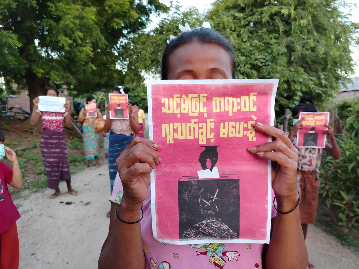 naingnaingaung's tweet photo. The"This Revolution Has No Turning Back" protest column in Sagaing Region continues its peaceful demonstrations today. They stand firm, displaying posters that read: "Don't legalize murder with your vote."
#SagaingProtest
#2025Oct3Coup
#WhatsHappeningInMyanmar https://t.co/X6WMVy8vN2