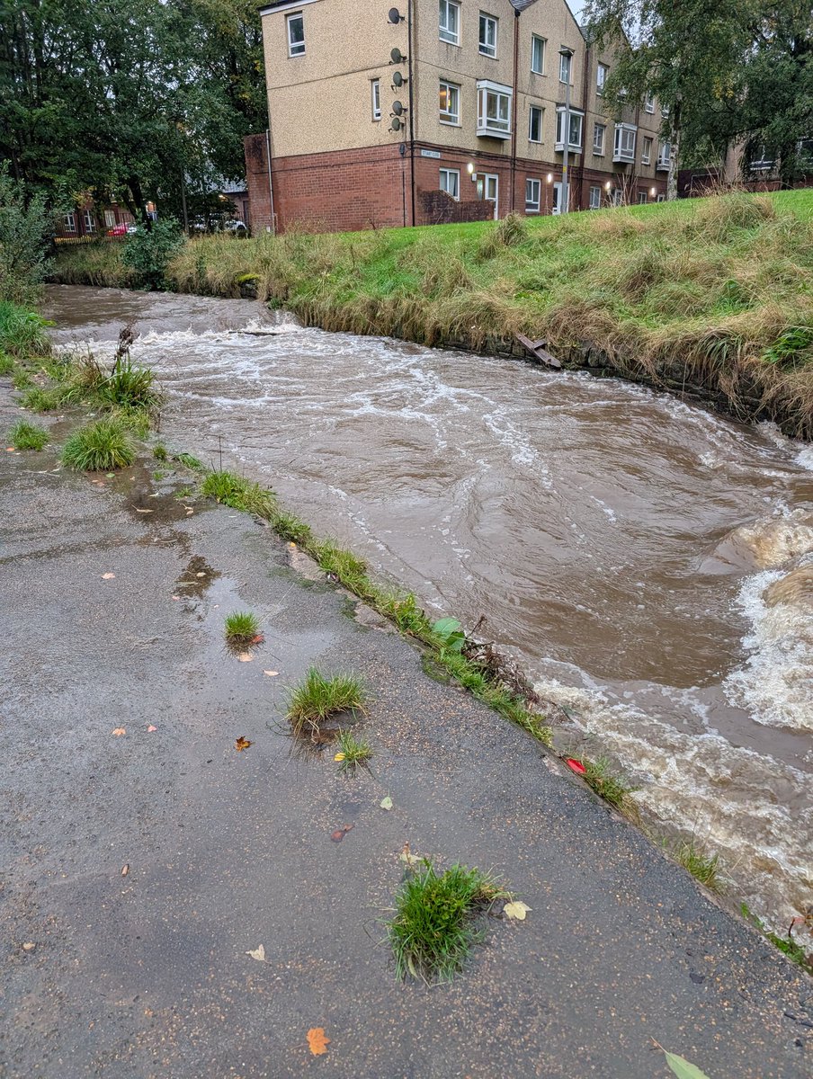 craiglc74's tweet photo. @Rovers @stokecity  as of half 5 Friday evening, the river Darwen 2 miles up river of Ewood Park. Close to bursting the bank, you can usually see to bottom. Needs to stop raining or it will be Ewood Pool again tomorrow #rovers https://t.co/iFzfZGFoyF